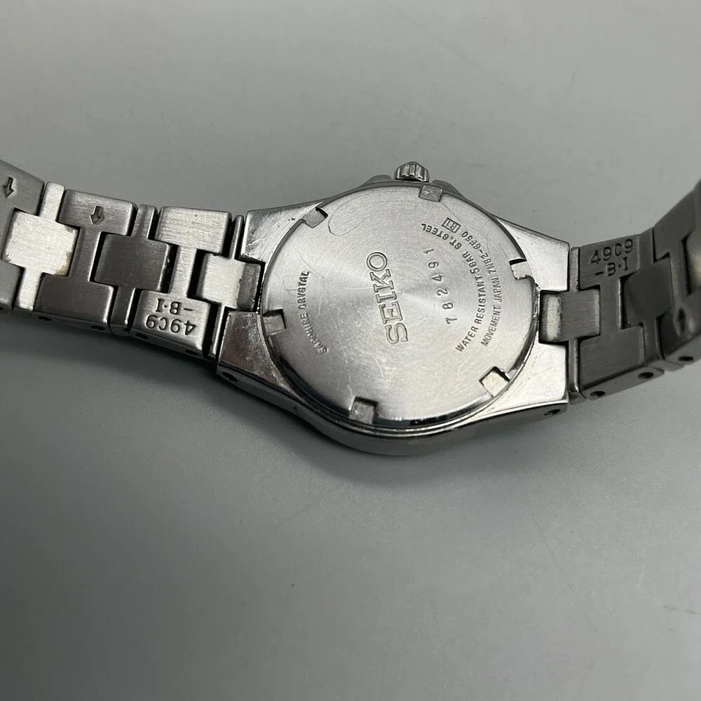 Seiko 7N82-6F50 Womens Watch 25mm White Dial Silver Tone Date New Battery 6